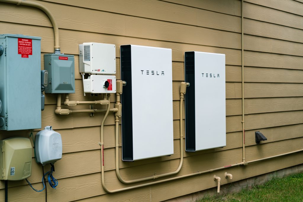 Home battery storage unit mounted on a wall